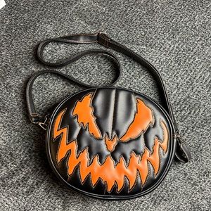 Love pain stitches purse